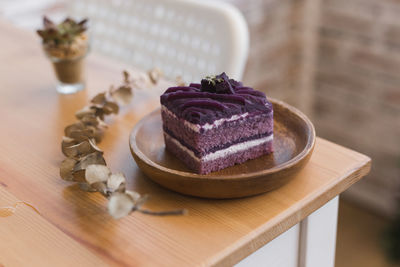 Close-up of cake served in bowl on table