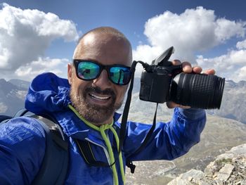 Portrait of man photographing