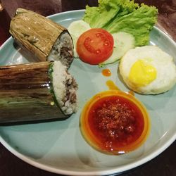 High angle view of breakfast served on table