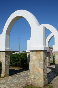 View of temple against clear blue sky