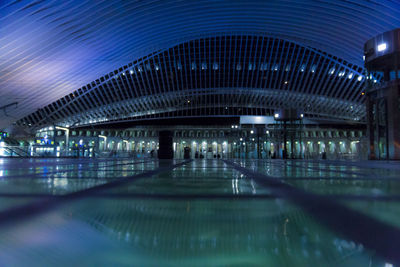 View of illuminated bridge at night