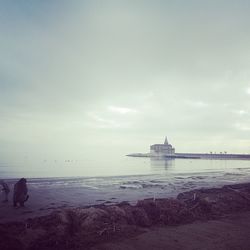 View of sea against cloudy sky