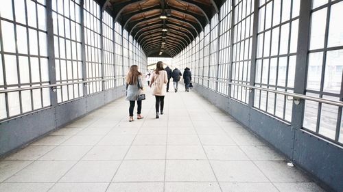 People walking in modern building