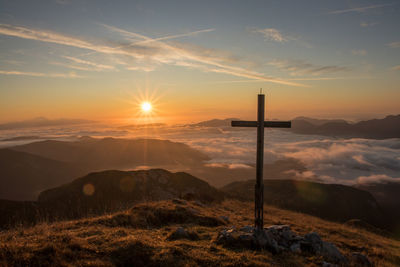 Scenic view of mountains against sky during sunset