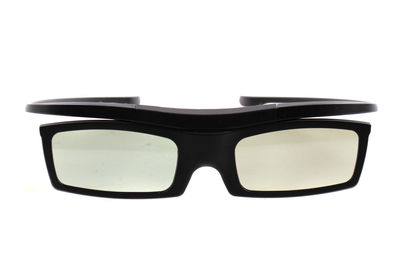 Close-up of sunglasses against white background