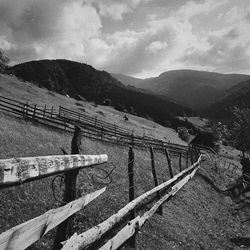 Scenic view of landscape and mountains against sky