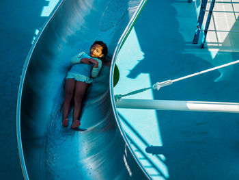 High angle view of woman in swimming pool