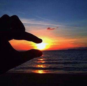 Scenic view of sea at sunset