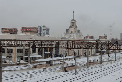 Buildings in city during winter