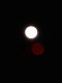 Scenic view of moon against sky at night