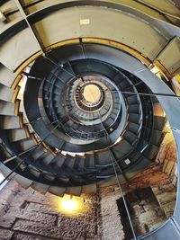 Directly below shot of spiral staircase in building