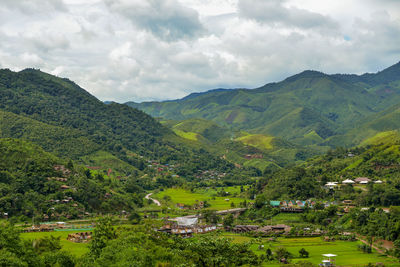 A tourist attraction with a village in the middle of the valley in the middle of nature nan thailand