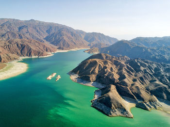 High angle view of sea and mountains