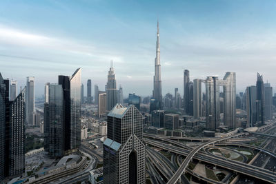 Modern buildings in city against sky