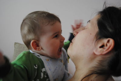 Portrait of mother with baby