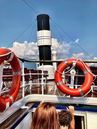 Rear view of nautical vessel against sky