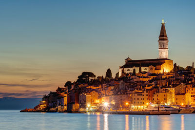 Rovinj in croatia with the iconic saint euphemia church after sunset