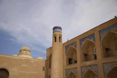 Low angle view of historic building against sky