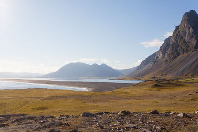 Scenic view of landscape and mountains against sky