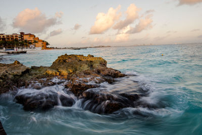 Scenic view of sea against sky during sunset