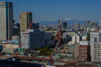 Cityscape against clear sky