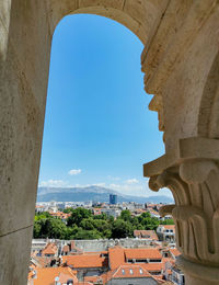 Buildings in city against sky