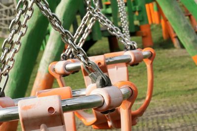 Close-up of chain on swing at park