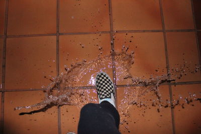 Low section of person on water