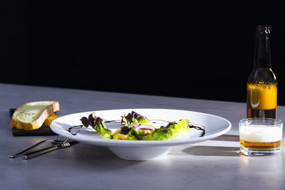 Food on table against black background