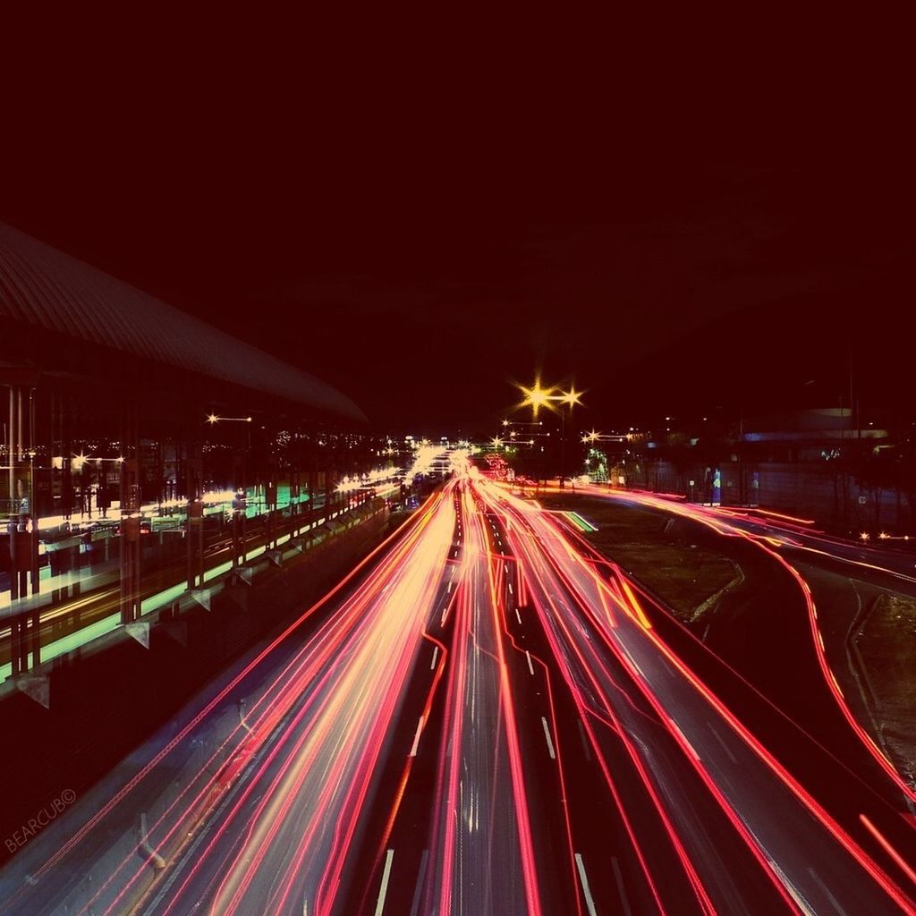 illuminated, night, light trail, long exposure, motion, speed, blurred motion, multi colored, transportation, road, red, lighting equipment, city, glowing, tail light, street, light - natural phenomenon, high angle view, traffic, the way forward