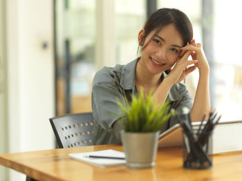 Portrait of a young woman at office