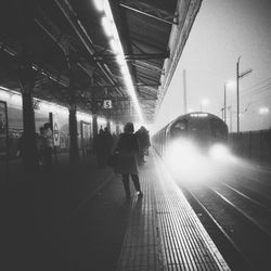 Blurred motion of man at night