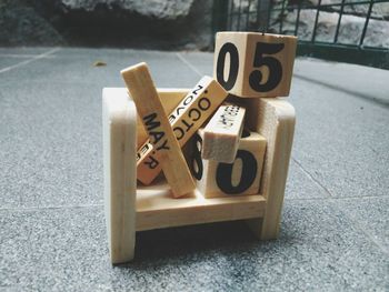 High angle view of wooden toys on flooring