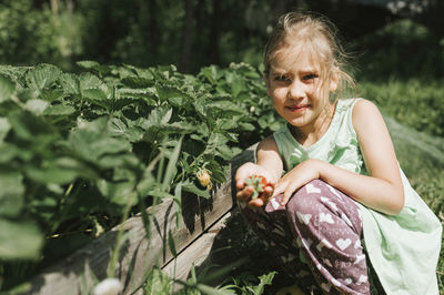 Girl smiling woman with plants