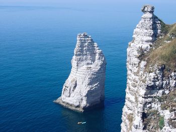 High angle view of sea against blue sky