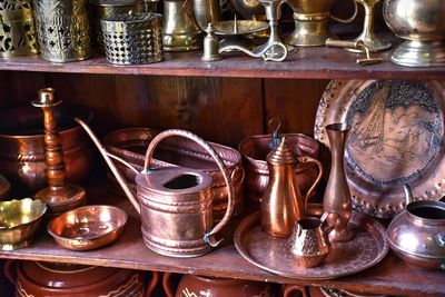 Antique utensils for sale in shop