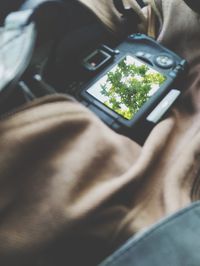 High angle view of man using mobile phone