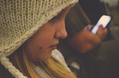 Close-up of girl wearing knit hat