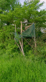 Wooden chair on field