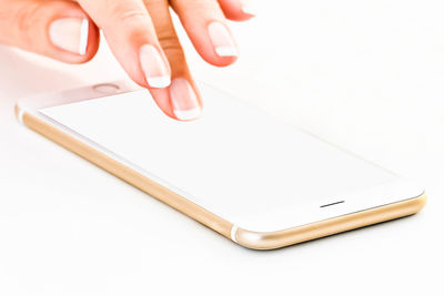 Close-up of hand using mobile phone