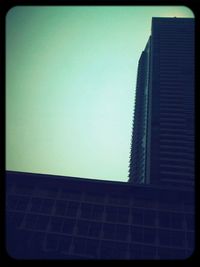 Low angle view of buildings against clear sky