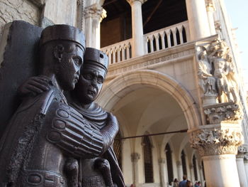 Low angle view of statue of historic building