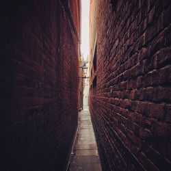 Walkway amidst buildings