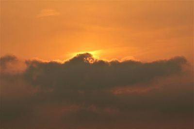 Low angle view of dramatic sky during sunset
