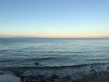 Scenic view of sea against clear sky