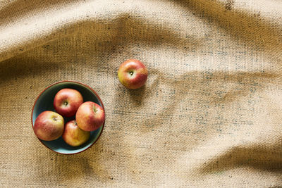 High angle view of apples in bowl on table