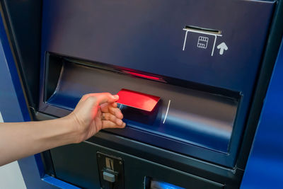 Midsection of woman using smart phone