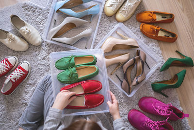 High angle view of multi colored shoes on table