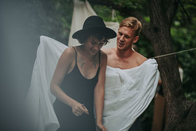 Young couple standing outdoors