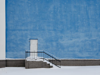 Staircase against blue sky